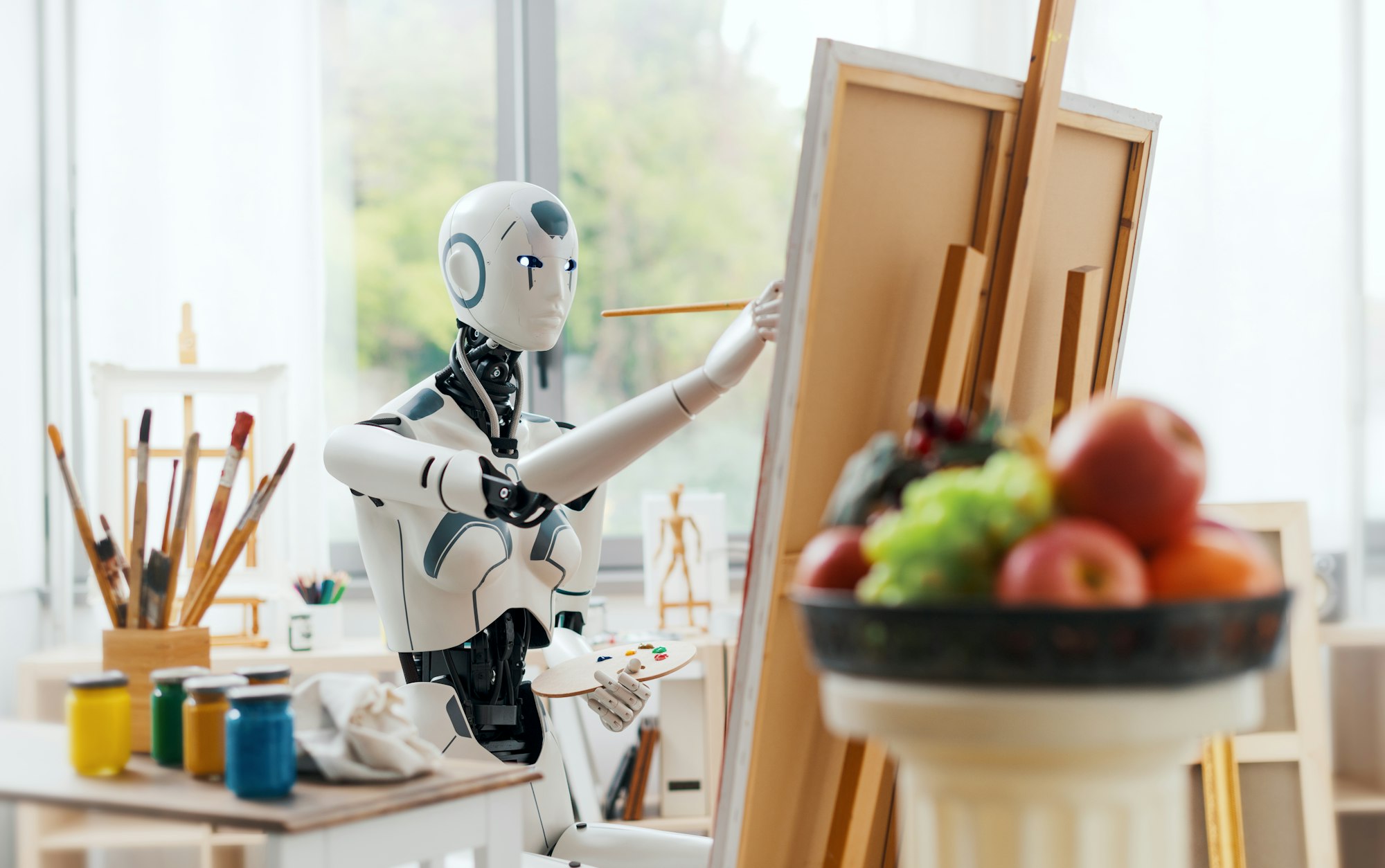 AI robot painting in the art studio