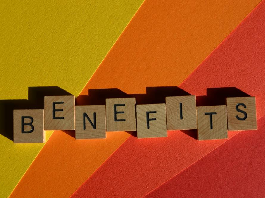 Benefits, Word in 3D wooden alphabet letters isolated on background