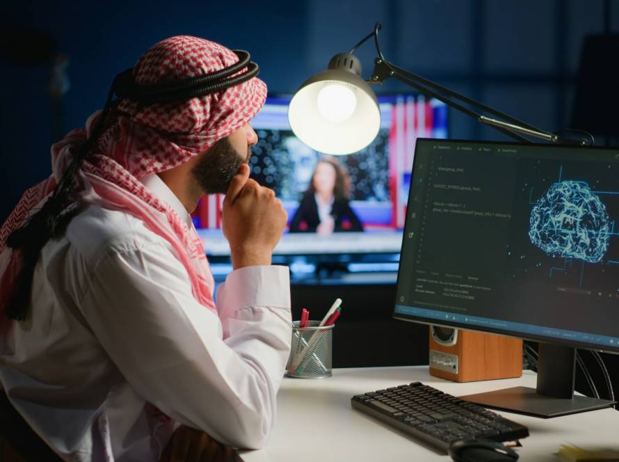 Computer operator updating AI code